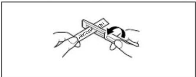 BROTHER P-touch PT-1500PC - Removing the label backing - 1