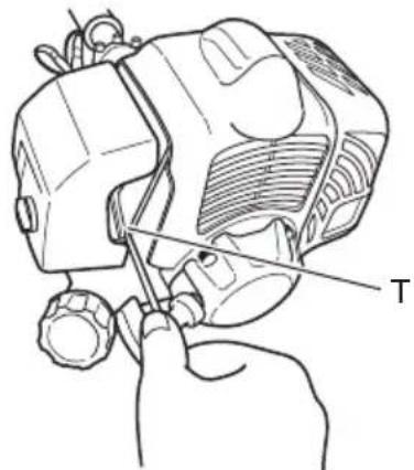 Technical diagram showing a hand using a tool to adjust or install a mechanical component labeled 'T'