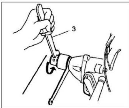 Technical diagram showing a hand using a wrench to adjust a mechanical component, labeled with number 3