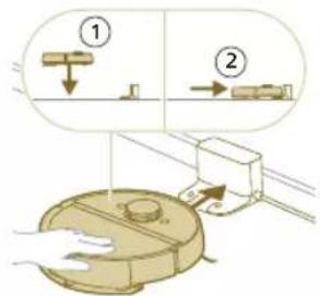 Diagram showing two labeled mechanical components with arrows indicating assembly or process steps, including a circular component and a rectangular block.