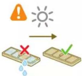 Safety warning symbol showing sun and water drop, with checkmark indicating failure or rejection