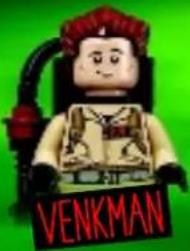 Lego-style character with red hair and outfit, standing beside a black 'VENKMAN' sign (no other text or symbols)