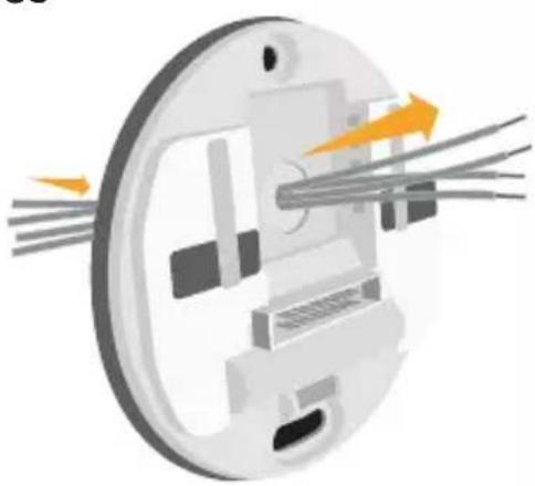 HONEYWELL RCH9310WF - Agrupe e inserte los cables a través del soporte transparente de goma - 1