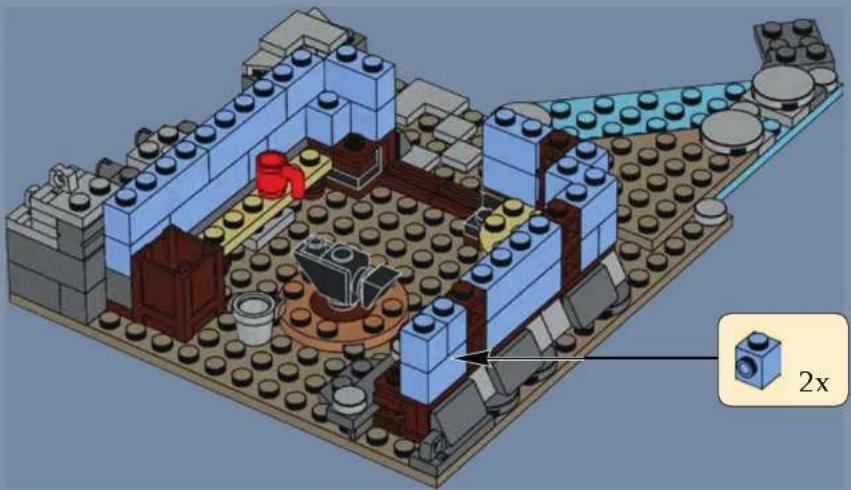 3D architectural diagram of a LEGO building complex with visible walls, legs, and structural elements (no text or symbols)