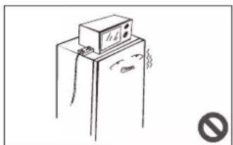 Simple line drawing of a refrigerator with a mounted appliance and a smoke swab (no text or symbols)