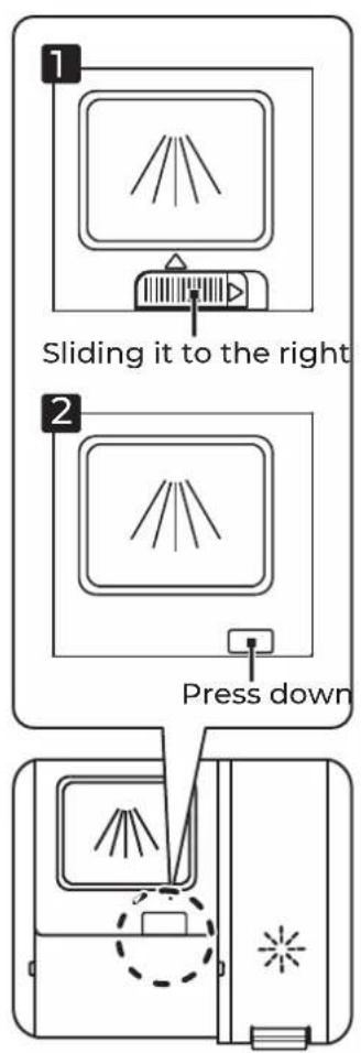 Sliding it to the right Press down