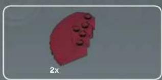 Pink 3D object with circular features, labeled '2x' at bottom left (no other text or symbols)