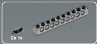 Exterior view of a metal connector with multiple terminal slots and a small inset image showing a 2x1x magnification (no text or symbols on the main components)