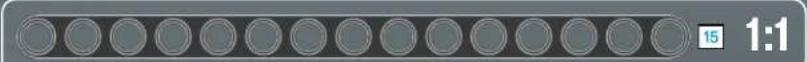 Circular object with evenly spaced holes on a gray background, no text or symbols visible