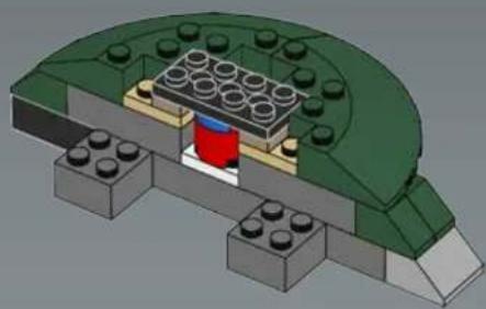 3D diagram of a LEGO structure with embedded components and a red component (no text or symbols)