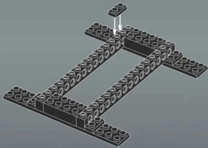 3D diagram of a LEGO structure with circular elements and an arrow indicating assembly (no text or symbols)