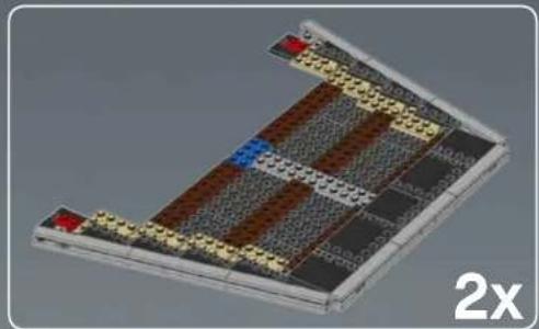 3D architectural model of a modular building structure with grid patterns and colored markers (no text or symbols)