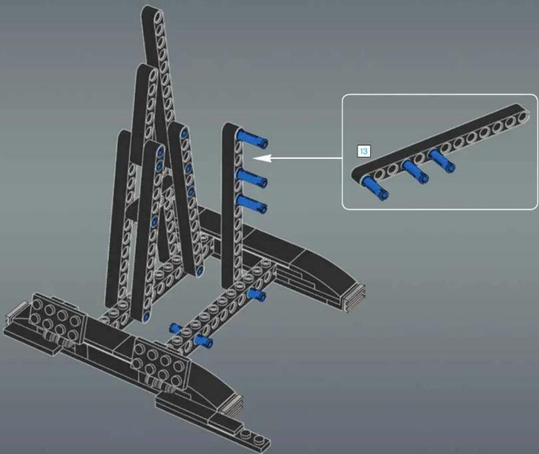 3D mechanical assembly diagram showing structural components with blue cylindrical elements and a zoomed-in detail view (no text or symbols)