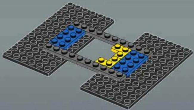 3D diagram of a LEGO structure with blue and yellow blocks on two gray circular bases (no text or symbols)