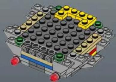 3D diagram of a LEGO structure with black and yellow blocks, red wheels, and a central grid (no text or symbols)