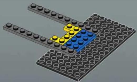 3D diagram of a LEGO structure with stacked blocks and a highlighted blue block (no text or symbols)