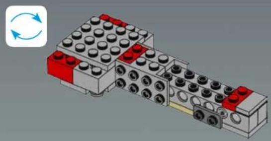 3D diagram of a LEGO-based mechanical assembly with red and white components, no text or symbols present