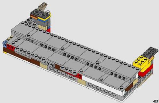 3D architectural model of a multi-story building with visible structural elements and color-coded components (no text or symbols)