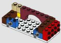 3D diagram of a LEGO structure with colored blocks and a central arch (no text or symbols)
