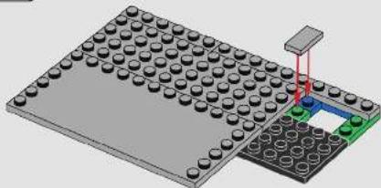 3D diagram of a microcontroller with a grid of pins and an attached circuit board (no text or symbols visible)