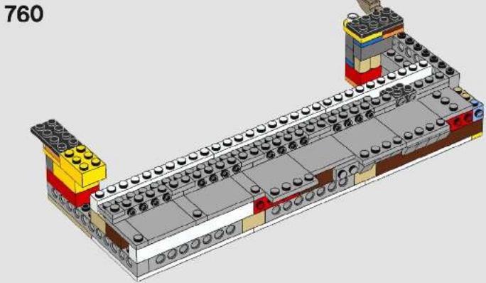 3D architectural model of a multi-story building with visible structural elements and color-coded components (no text or symbols)
