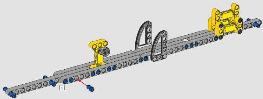 3D mechanical assembly diagram showing a conveyor system with blue and gray components, no visible text or symbols