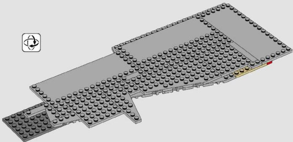 3D architectural model of a building with multiple brickwork blocks and a highlighted section (no text or symbols)