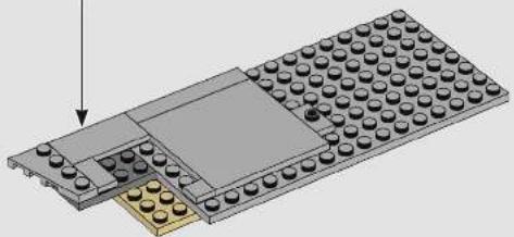 Isometric diagram of a LEGO base with a highlighted component and an arrow pointing to it (no text or symbols present)