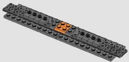 3D rendering of a black plastic component with multiple circular holes and an orange section (no text or symbols)