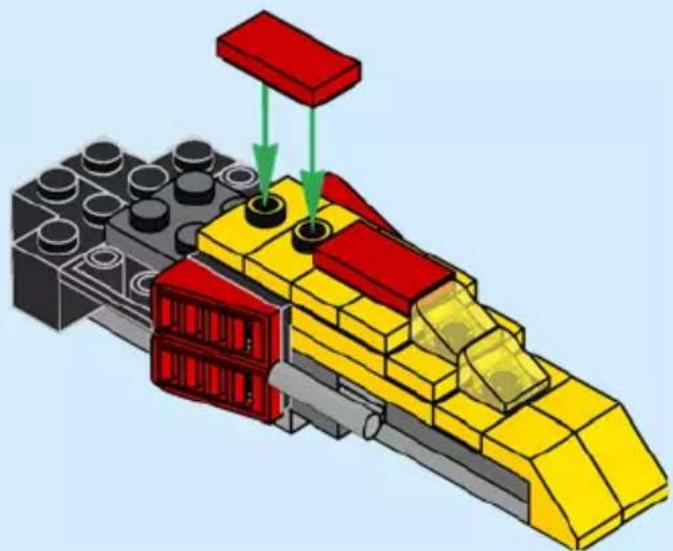 3D diagram of a yellow and red LEGO mechanical assembly with green arrows indicating motion or force direction (no text or symbols)