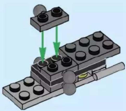 Diagram of a LEGO brick base with two stacked blocks and green arrows indicating movement or assembly (no text or symbols)