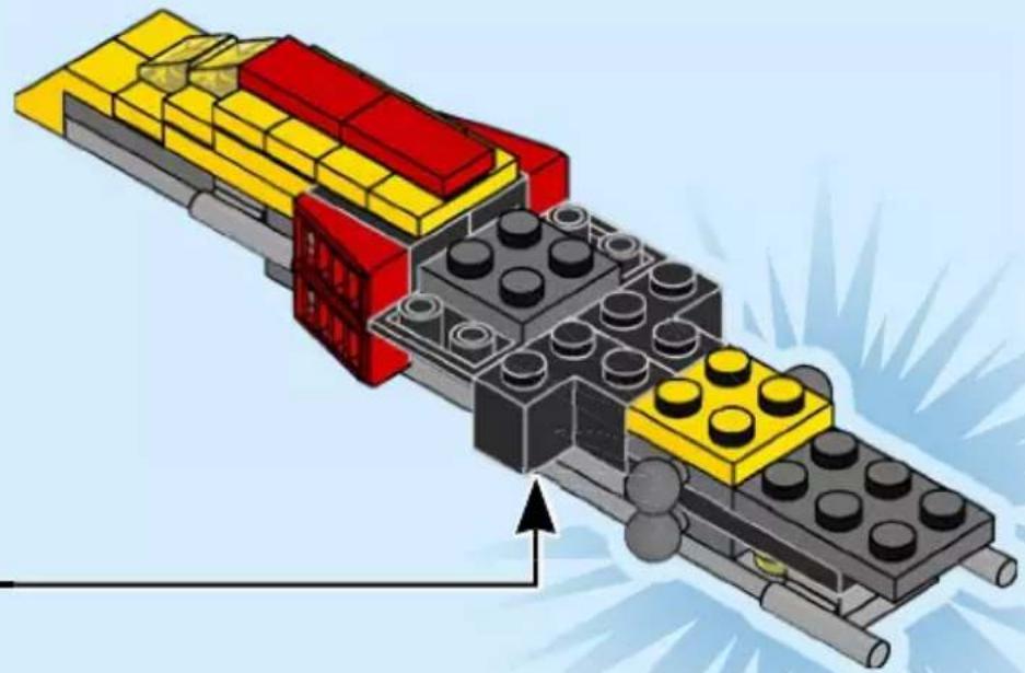 Illustration of a LEGO train with yellow and red blocks, showing structural components and motion direction (no text or symbols)