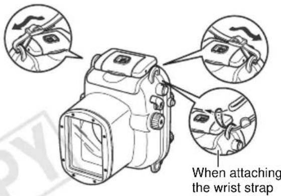 When attaching the wrist strap