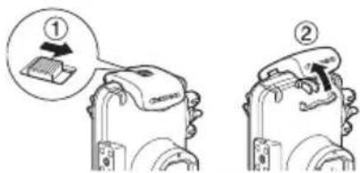 CANON WP-DC27 - 4Verschieben Sie die Entriegelungstaste wie gezeigt, und losen Sie die Verriegelung, um den Deckel zu öffnen. - 1