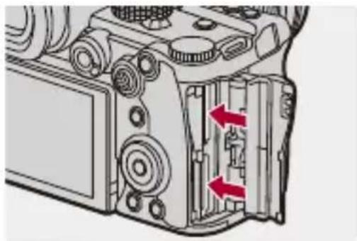 PANASONIC Lumix DC-G9M2 - Retrait d'une carte - 1