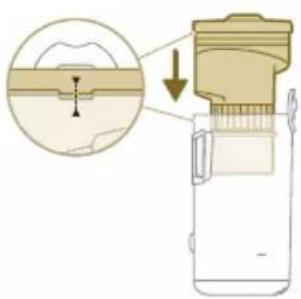 Diagram illustrating a mechanical device with a magnified cross-section showing internal components and a downward arrow indicating process flow.