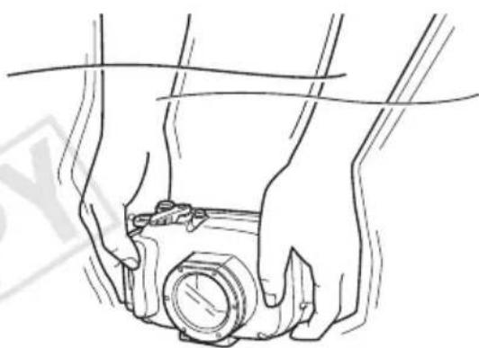 CANON WP-DC36 - Open the case and remove the camera. - 1