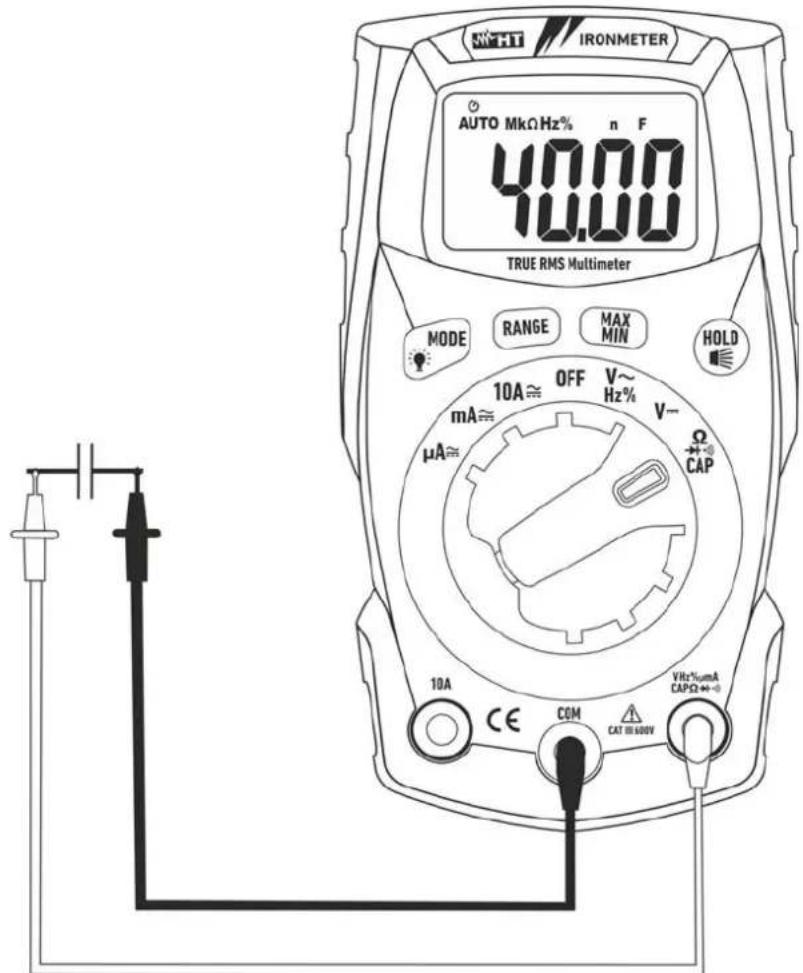 NHT IRONMETER AUTO MkΩ Hz% n F 40.00 TRUE RMS Multimeter MODE RANGE MAX MIN HOLD 10A ≈ OFF V~ Hz% mA ≈ V- μA ≈ CAP 10A CE COM CAT III 600V VRt%μmA CAPΩ ↔-0