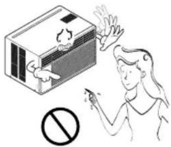 Safety warning illustration showing a person using a fire extinguisher next to an air conditioner unit with a 'No' symbol