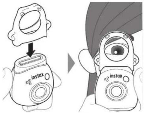 FUJIFILM Instax Pal - Fixez l'anneau amovible multi-usage fourni sur le dessus de l'appareil photo en l'enclenchant sur la zone du bouton d'alimentation (comme illustré ci-dessous). - 1