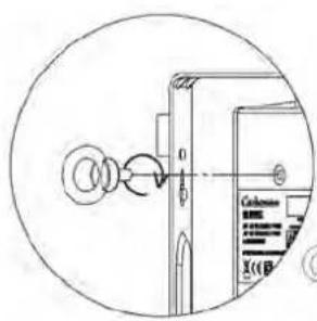 Diagram showing a device with labeled components and directional arrows, likely illustrating a mechanical or electrical process.