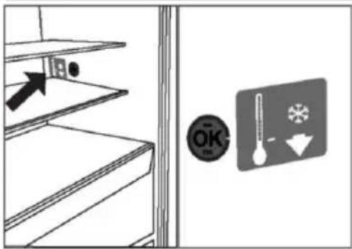 Diagram showing a staircase with an arrow pointing to a wall-mounted device, alongside a warning sign with thermometer and snowflake symbols.