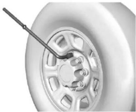 Pontiac Firefly (1995) - Removing the Flat Tire and Installing the Spare Tire - 2
