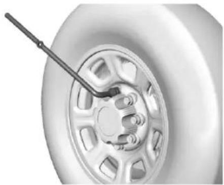 Pontiac Firefly (1993) - Removing the Flat Tire and Installing the Spare Tire - 2