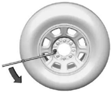 Pontiac Impulse (1993) - Removing the Flat Tire and Installing the Spare Tire - 3