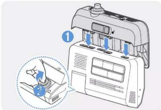 Diagram showing a device with labeled parts and a magnified view of the interior component being inserted into a box.