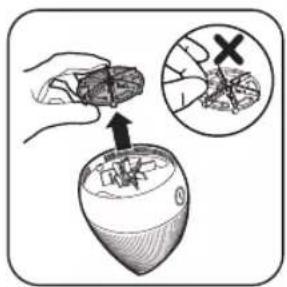 Diagram illustrating a hand holding a small object above a computer monitor, with an inset showing a close-up of the object's cross.