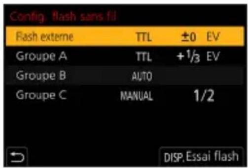 Config. flash sans fil Flash externe TTL ±0 EV Groupe A TTL +1/3 EV Groupe B AUTO Groupe C MANUAL 1/2 → DISP.Essai flash