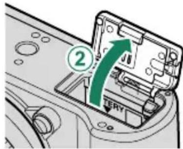 FUJIFILM X-T50 - Ouvrez le couvercle du compartment de la batterie. - 3