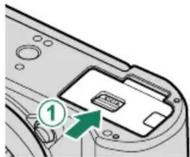 FUJIFILM X-T50 - Ouvrez le couvercle du compartment de la batterie. - 2